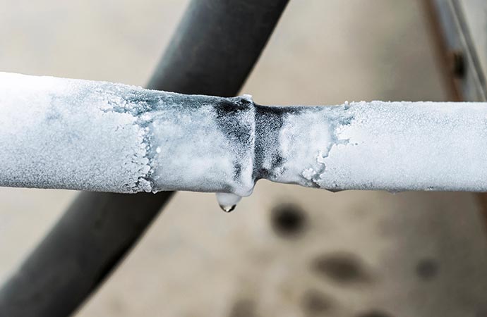 ac cooling air pipes covered by snow or frozen