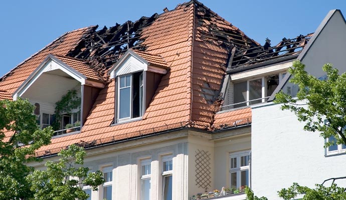 Fire damaged house roof