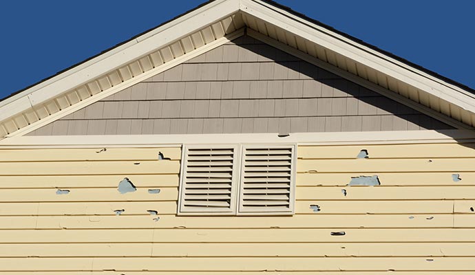 Hail damaged house